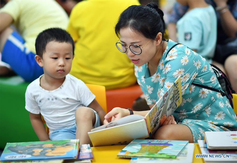 CHINA-HAINAN-SUMMER VACATION-LIBRARY-READING (CN)