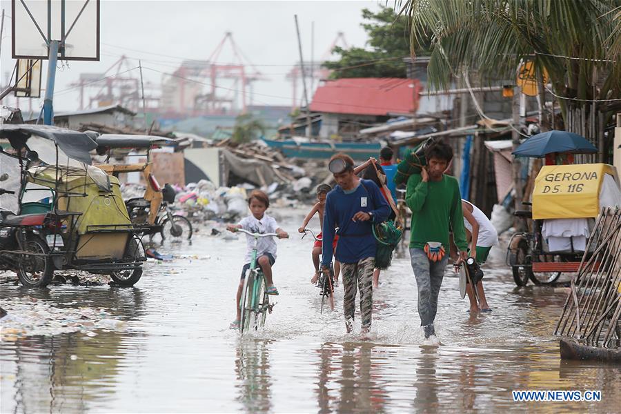 THE PHILIPPINES-MANILA-TROPICAL DEPRESSION HENRY