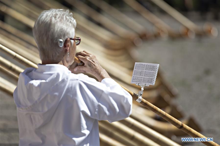 SWITZERLAND-SEEBENALP-SWISS ALPINE HORNS-PLAYING