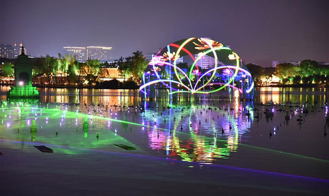 Visual arts performance staged at Daming Lake scenic spot in Ji'nan, E China