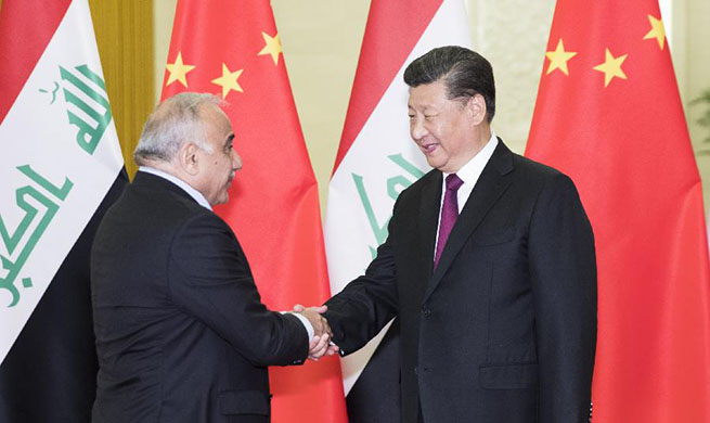 Xi meets with Iraqi prime minister