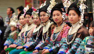 Miao women dress up to celebrate Spring Festival in SW China