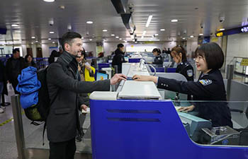 Police officers at immigration inspection checkpoint on duty during Spring Festival